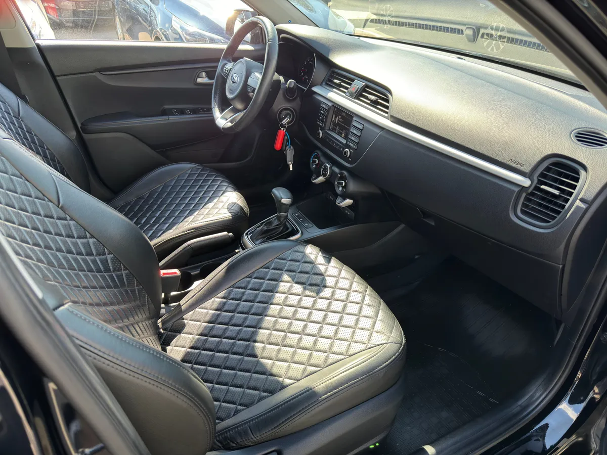 Kia Rio 1.4 AT (100 л.с.)