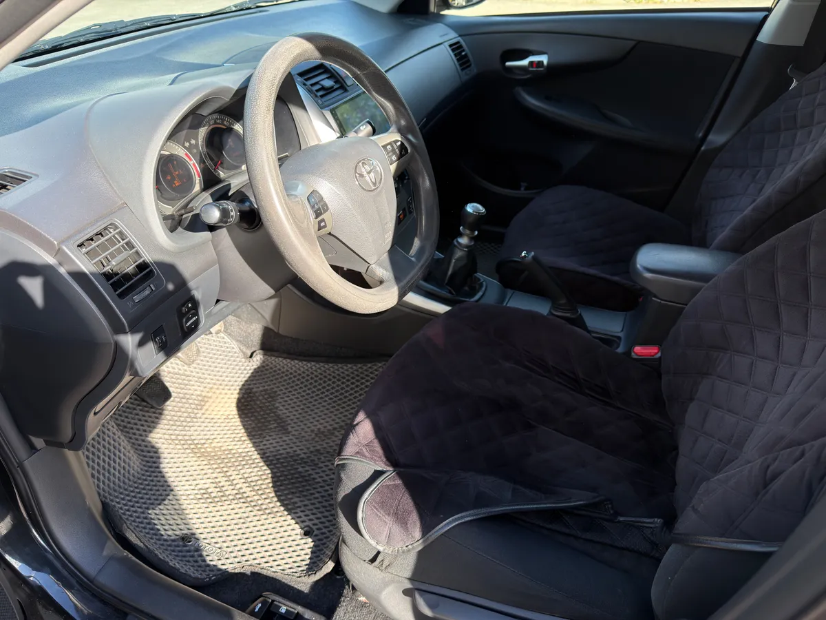 Toyota Corolla 1.6 MT (124 л.с.)