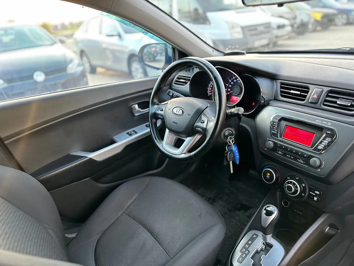 Kia Rio 1.4 AT (107 л.с.)
