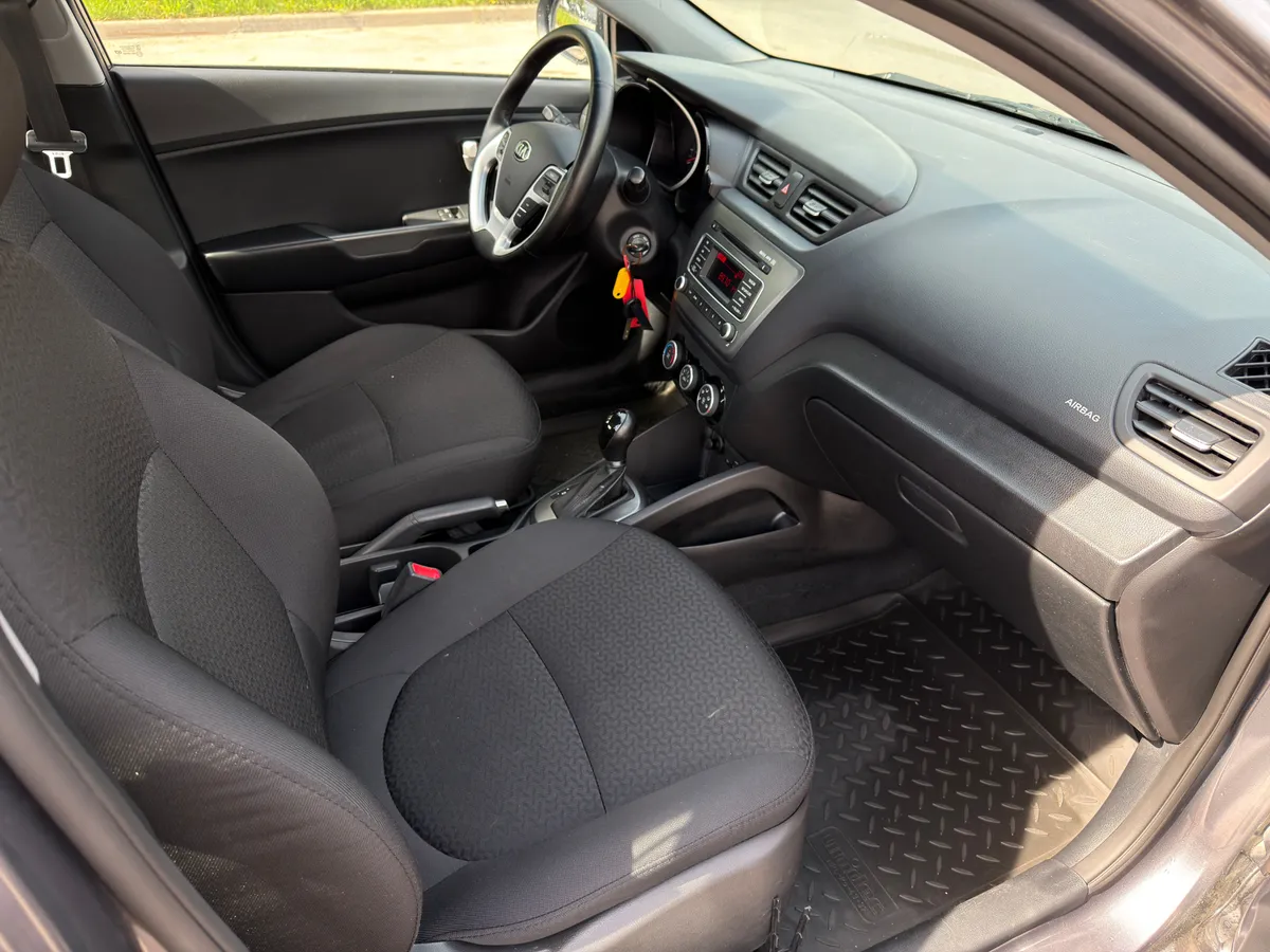 Kia Rio 1.6 AT (123 л.с.)