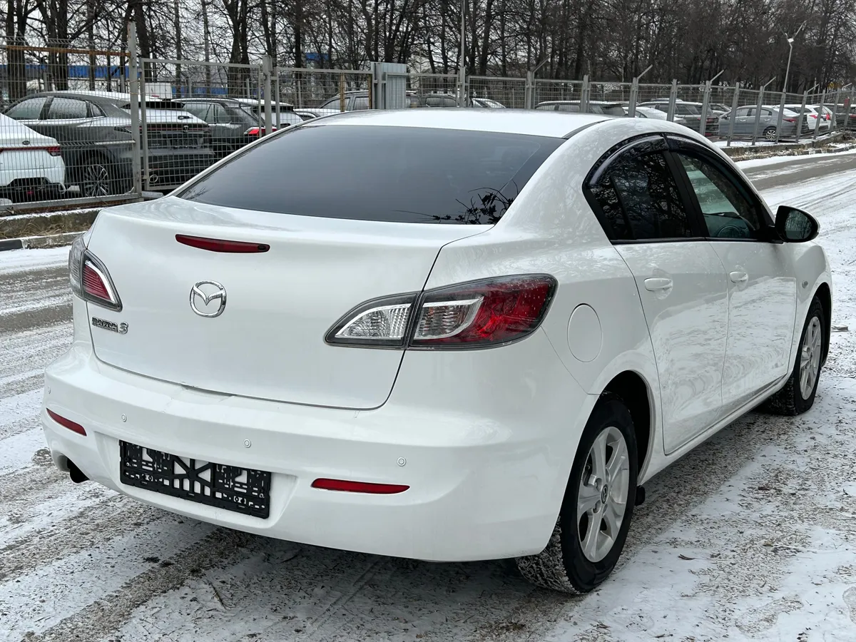 Mazda 3 1.6 AT (104 л.с.)