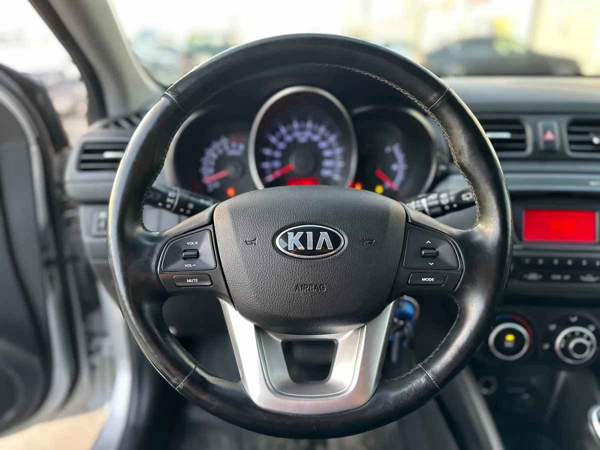 Kia Rio 1.4 AT (107 л.с.)
