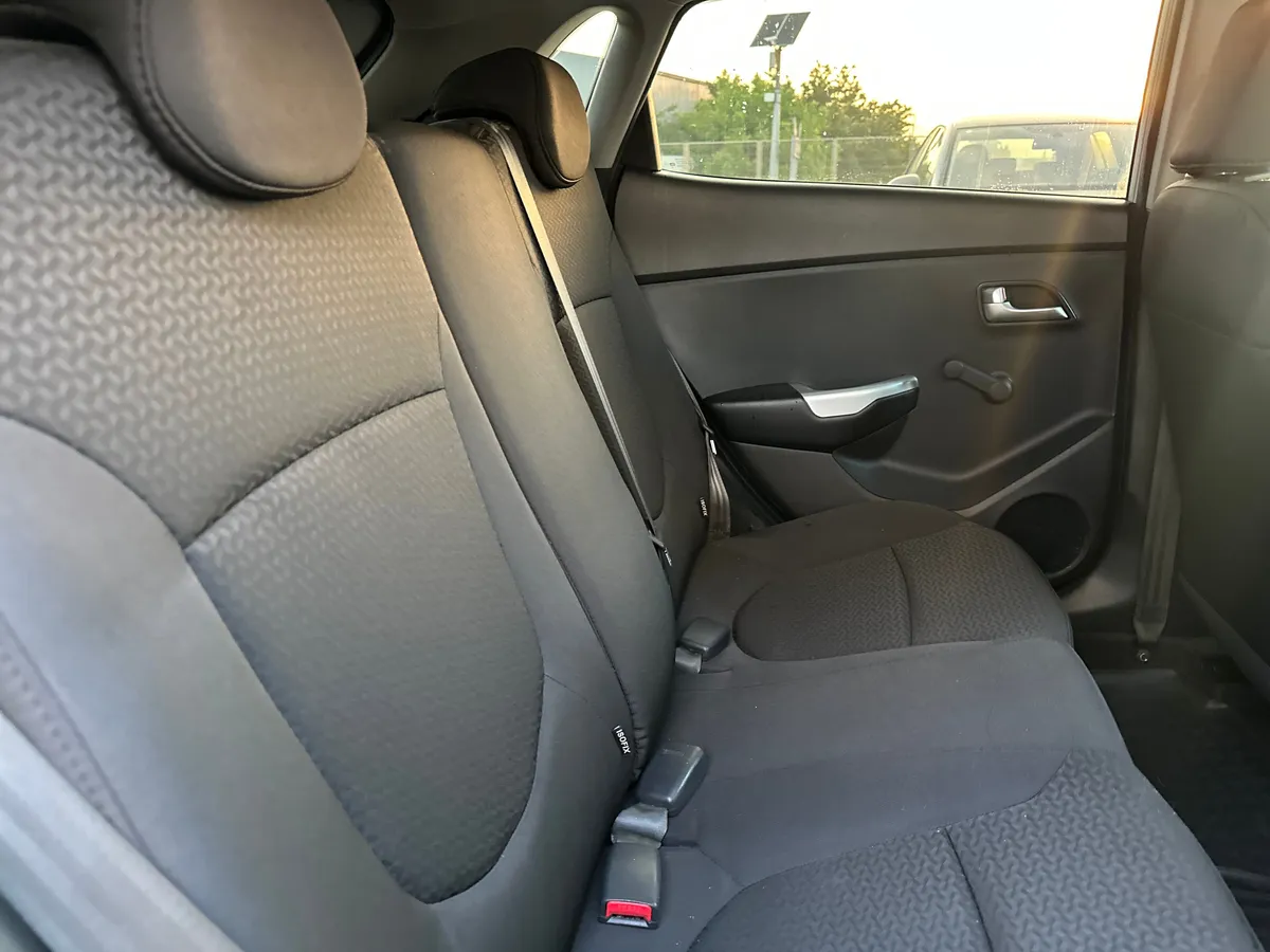 Kia Rio 1.4 AT (107 л.с.)