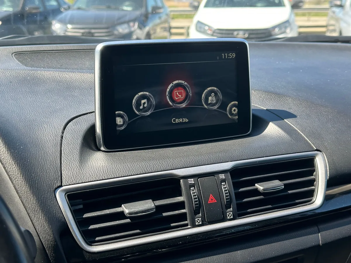 Mazda 3 1.6 AT (104 л.с.), 2014 — фото 12