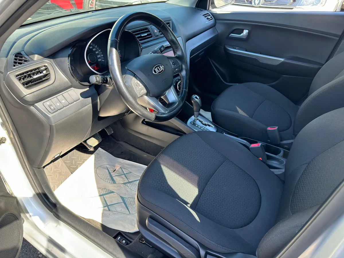Kia Rio 1.6 AT (123 л.с.)