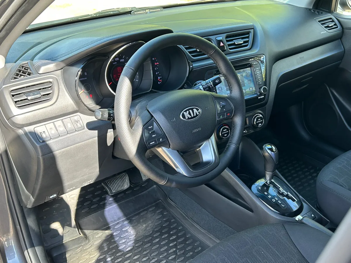 Kia Rio 1.6 AT (123 л.с.)