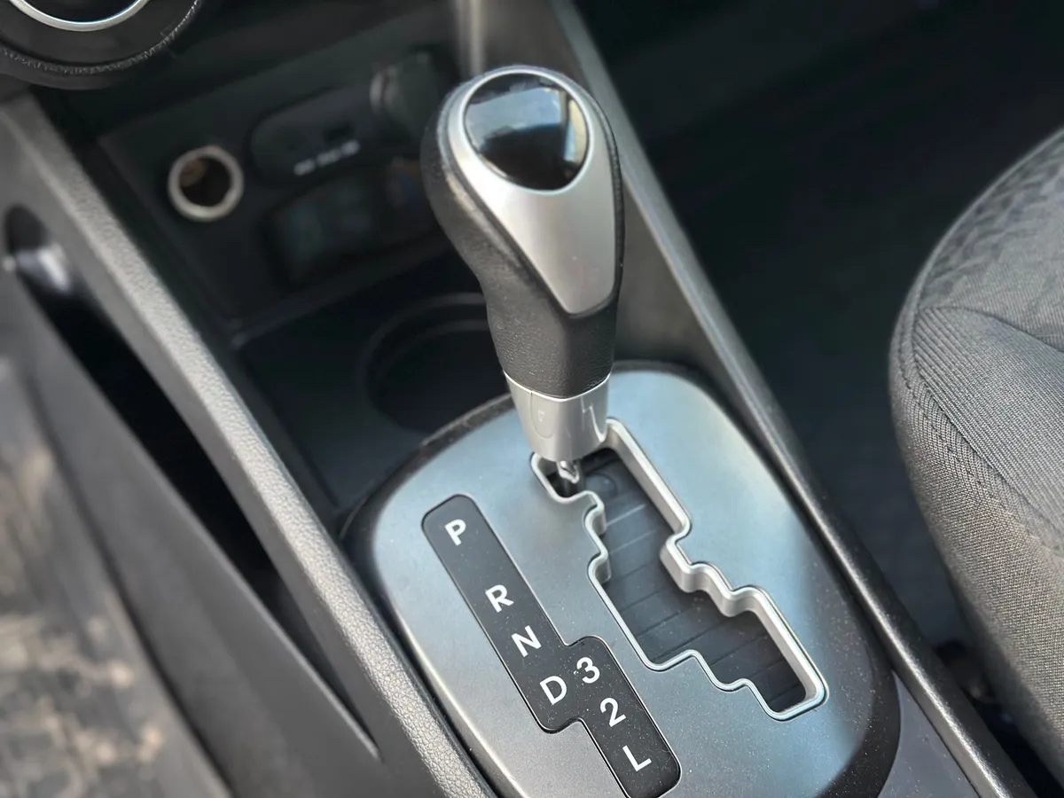Kia Rio 1.4 AT (107 л.с.)
