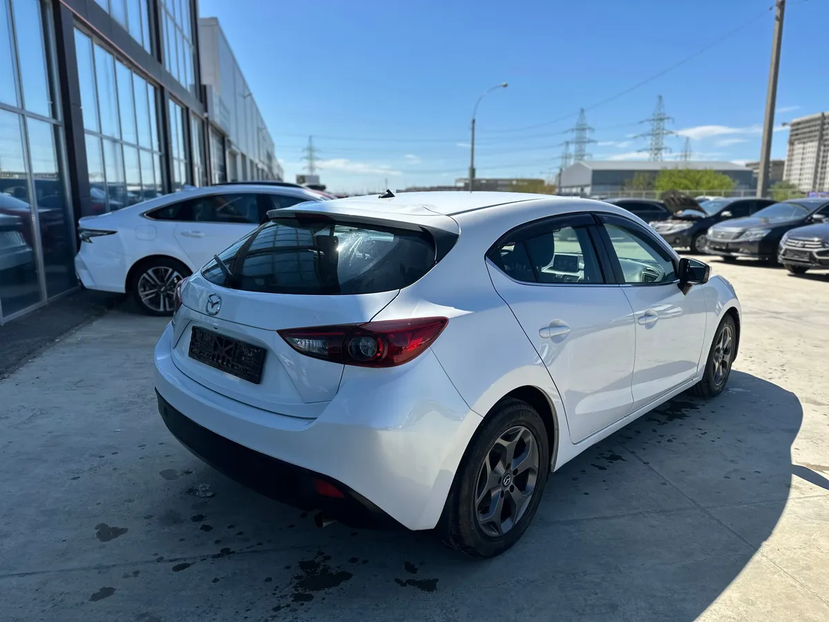 Mazda 3 1.6 AT (104 л.с.), 2014 — фото 4