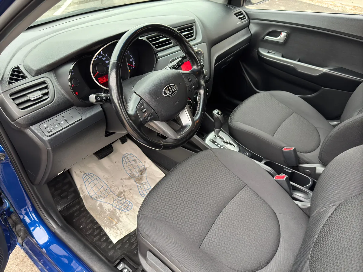 Kia Rio 1.4 AT (107 л.с.)