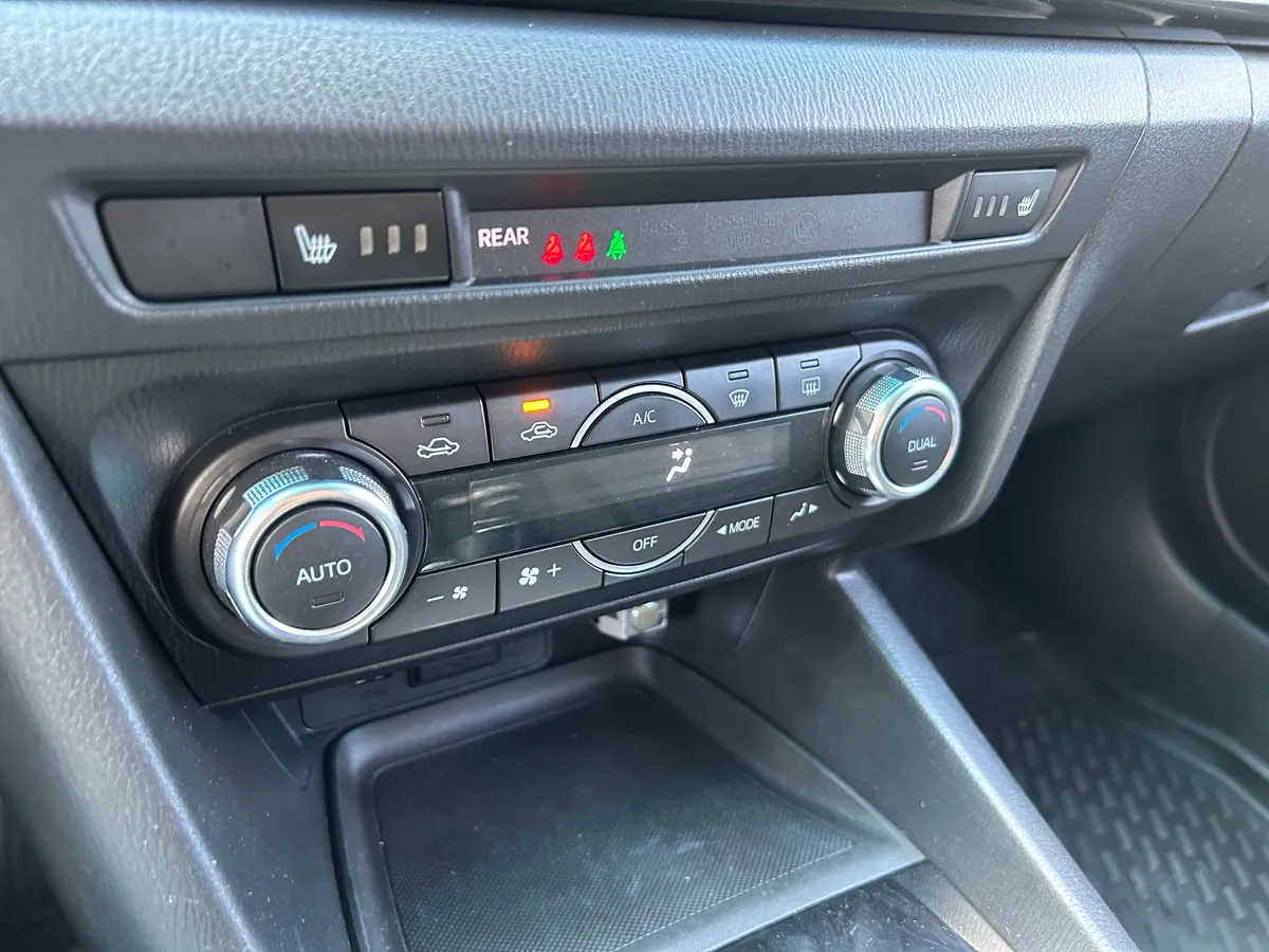Mazda 3 1.6 AT (104 л.с.)