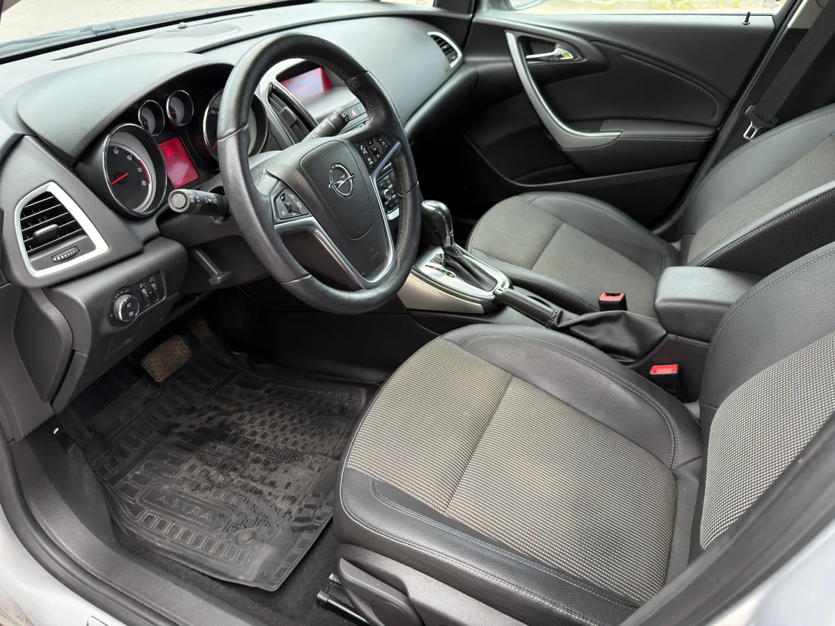 Opel Astra 1.6 AT (115 л.с.)