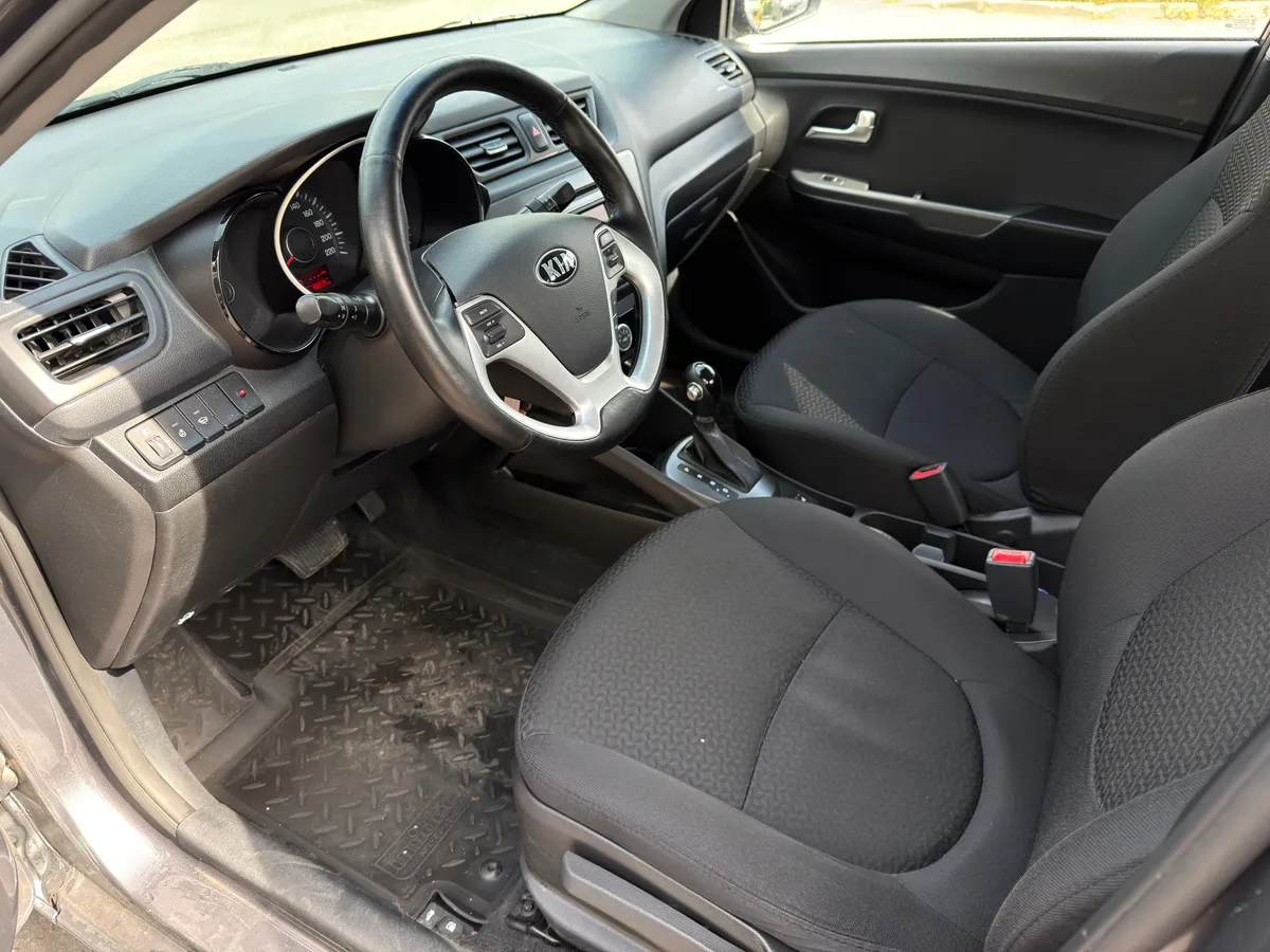 Kia Rio 1.6 AT (123 л.с.)