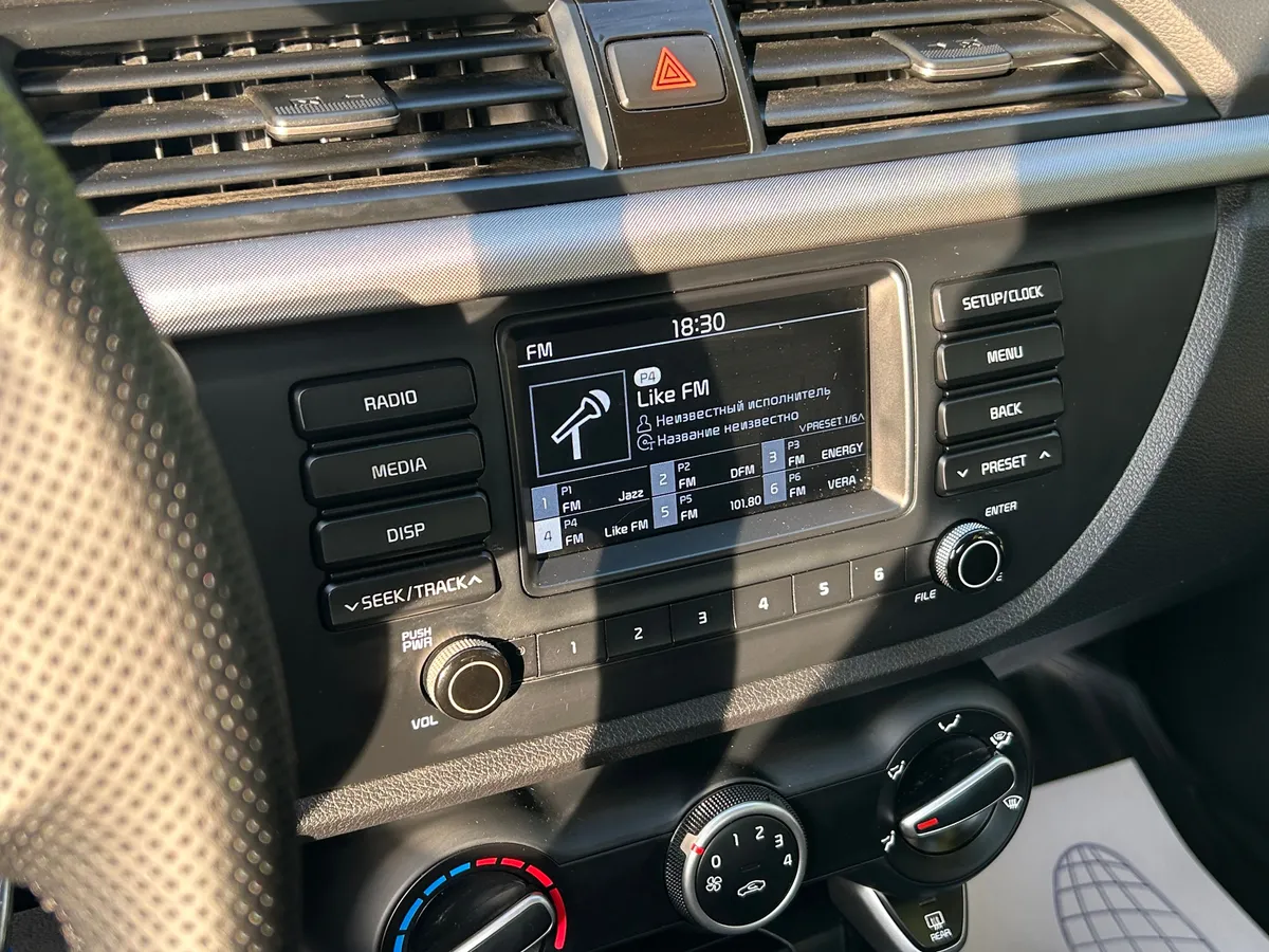 Kia Rio 1.4 AT (100 л.с.)