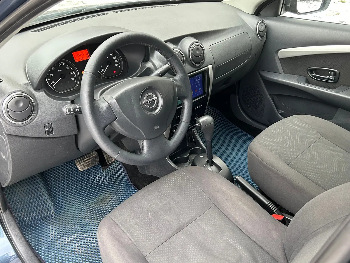 Nissan Almera 1.6 AT (102 л.с.)