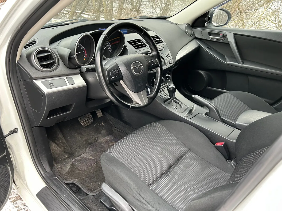 Mazda 3 1.6 AT (104 л.с.)