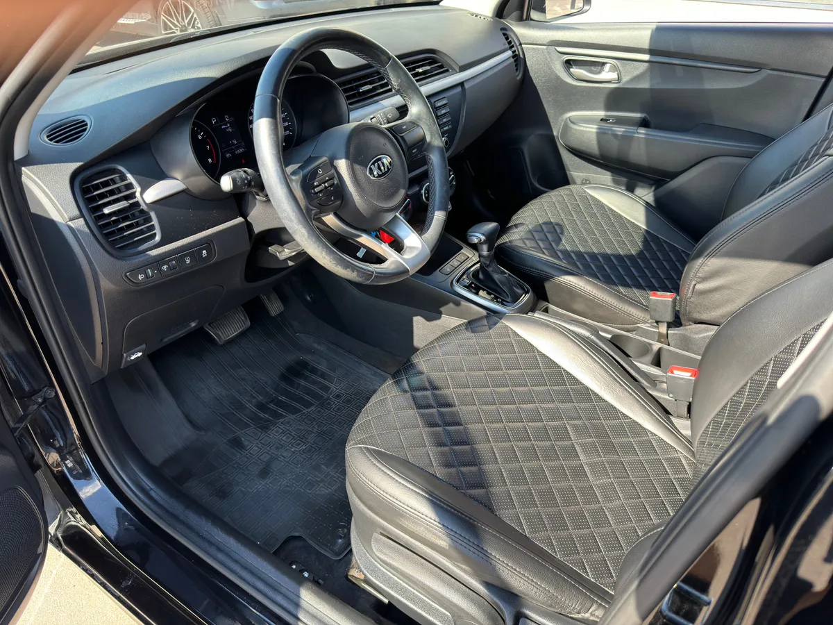 Kia Rio 1.4 AT (100 л.с.)