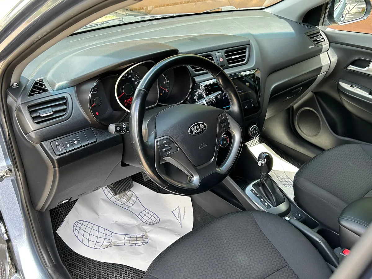 Kia Rio 1.6 AT (123 л.с.)