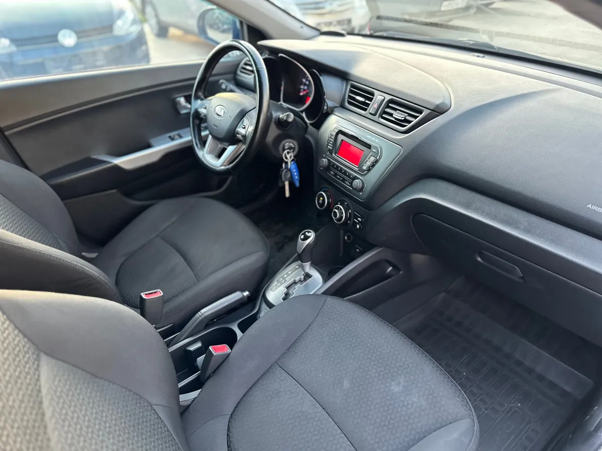 Kia Rio 1.4 AT (107 л.с.)