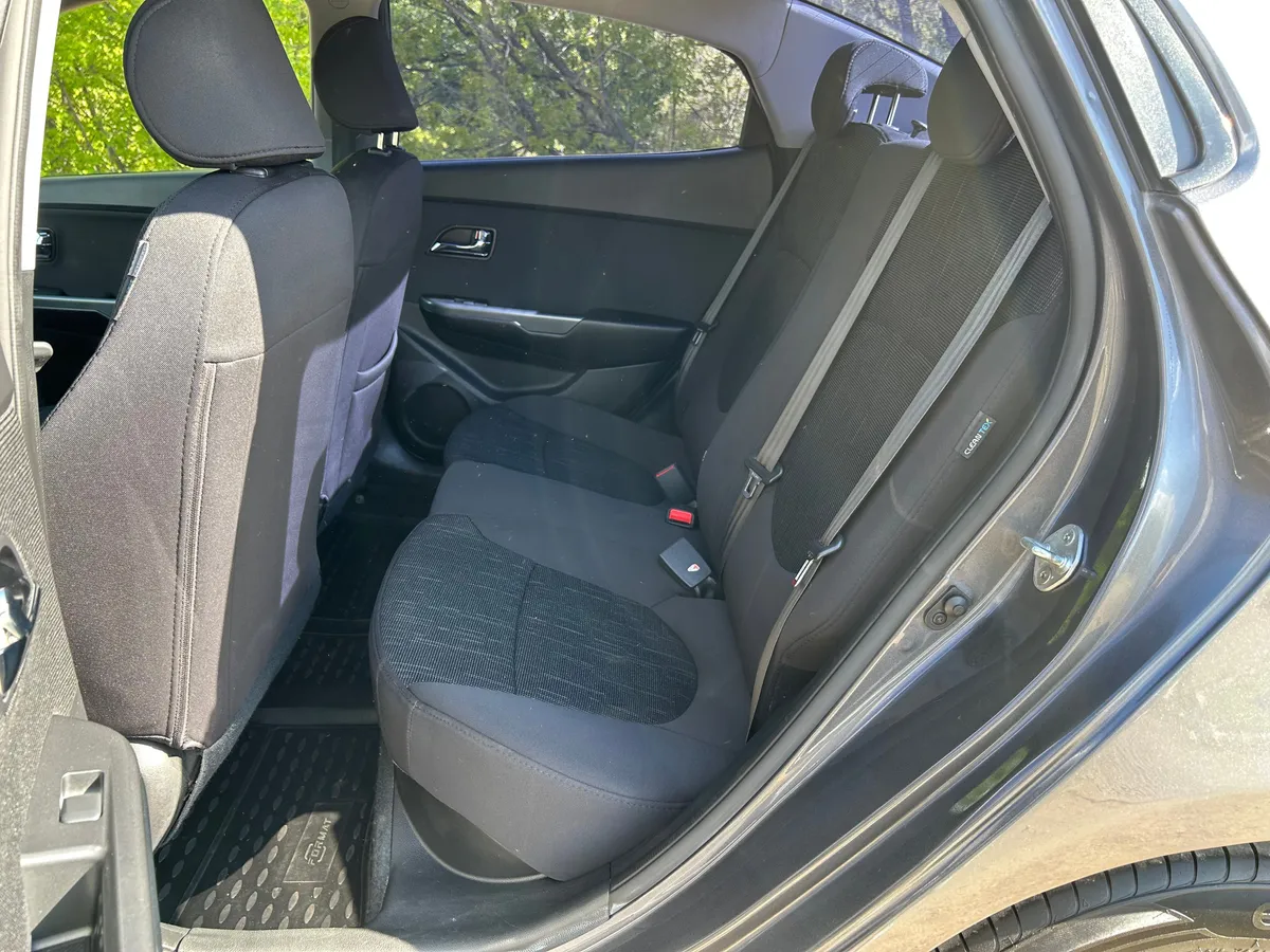 Kia Rio 1.6 AT (123 л.с.)