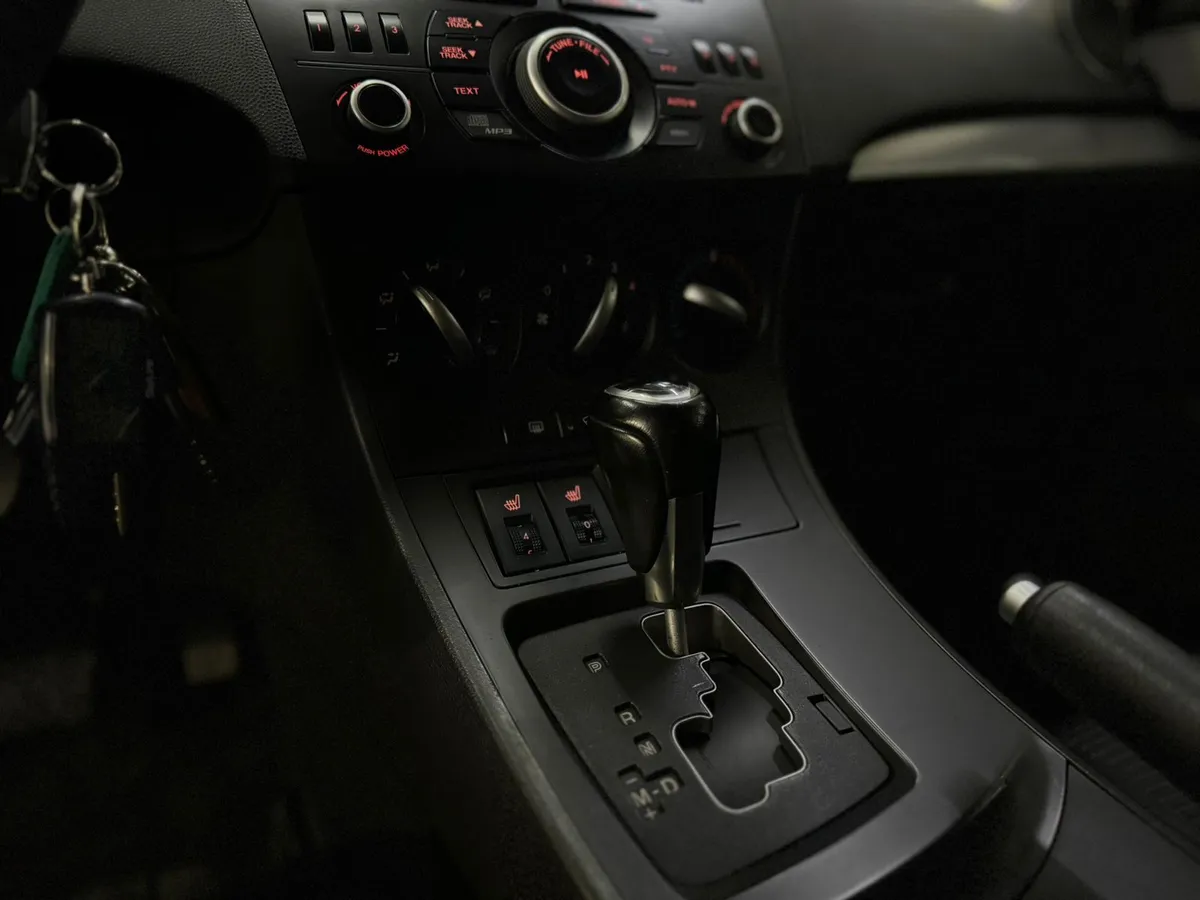 Mazda 3 1.6 AT (104 л.с.)