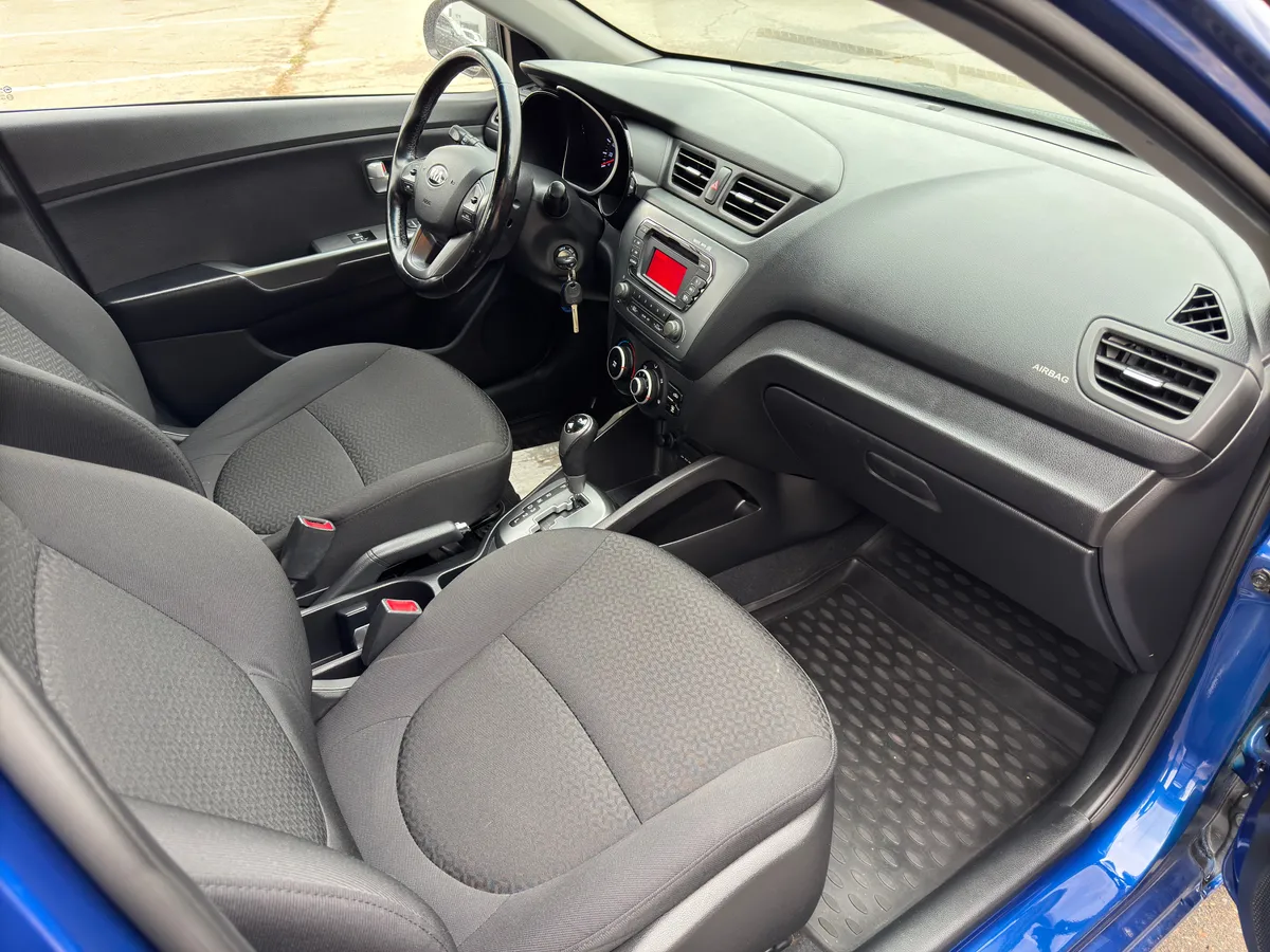 Kia Rio 1.4 AT (107 л.с.)