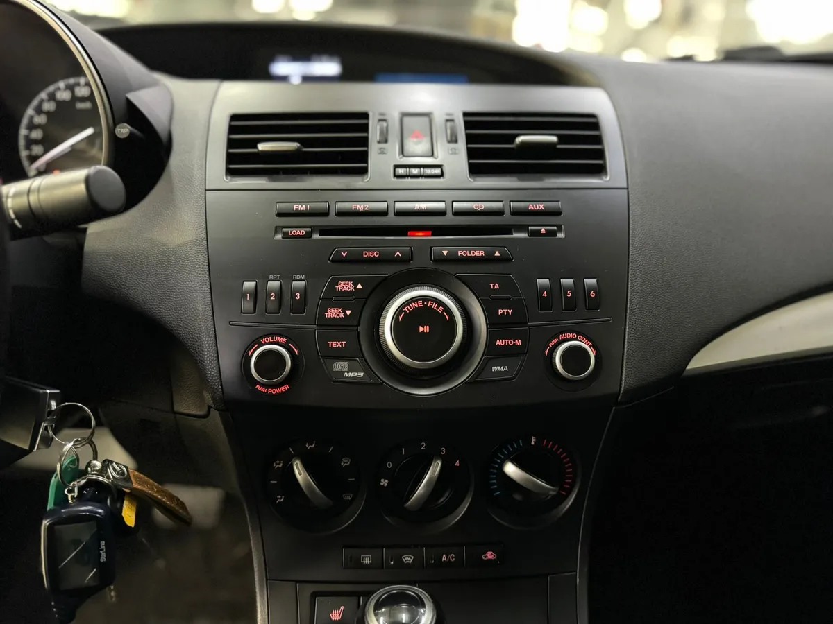 Mazda 3 1.6 AT (104 л.с.)