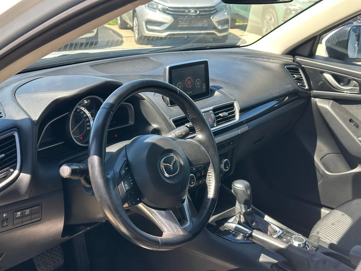Mazda 3 1.6 AT (104 л.с.), 2014 — фото 5