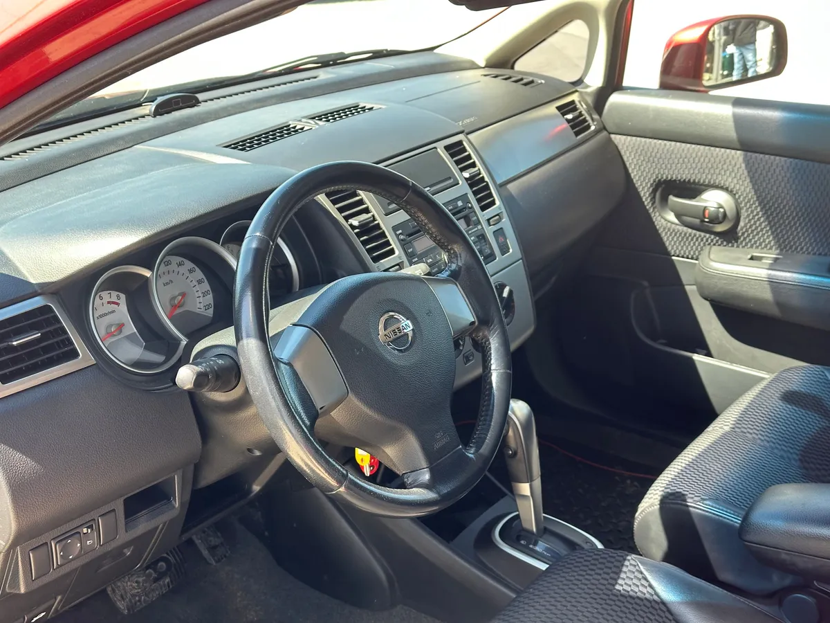 Nissan Tiida 1.6 AT (110 л.с.), 2008 — фото 6