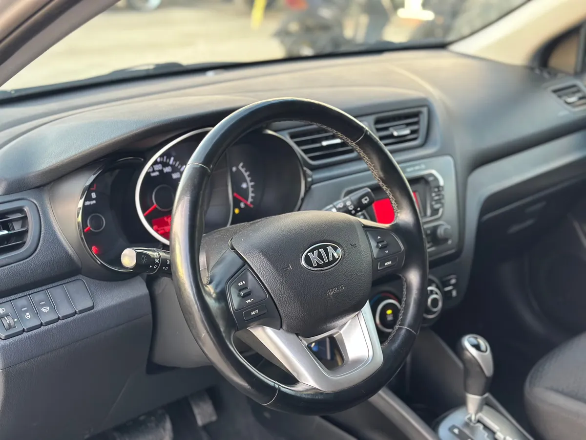 Kia Rio 1.4 AT (107 л.с.)