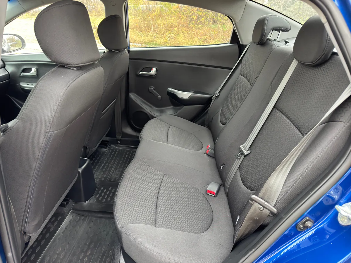 Kia Rio 1.4 AT (107 л.с.)